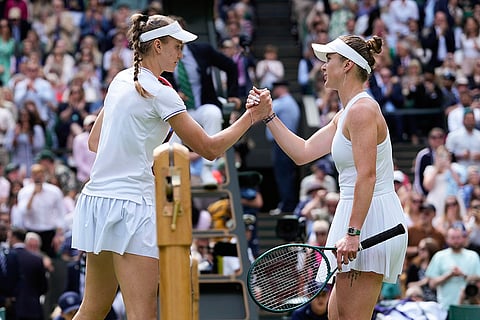 Elena Rybakina is congratulated by Elina Svitolina 